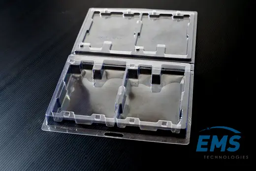Open clear PET blister pack with two moulded pockets for ESD-safe component packing, EMS Technologies