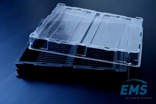 Black HIPS thermoformed ESD tray with its clear PET lid lifted clear, EMS Technologies